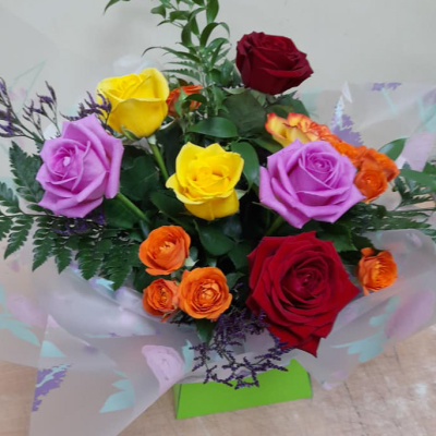 Sweet Romance - A bouquet of mixed beautiful roses is sure to create a lasting impression.